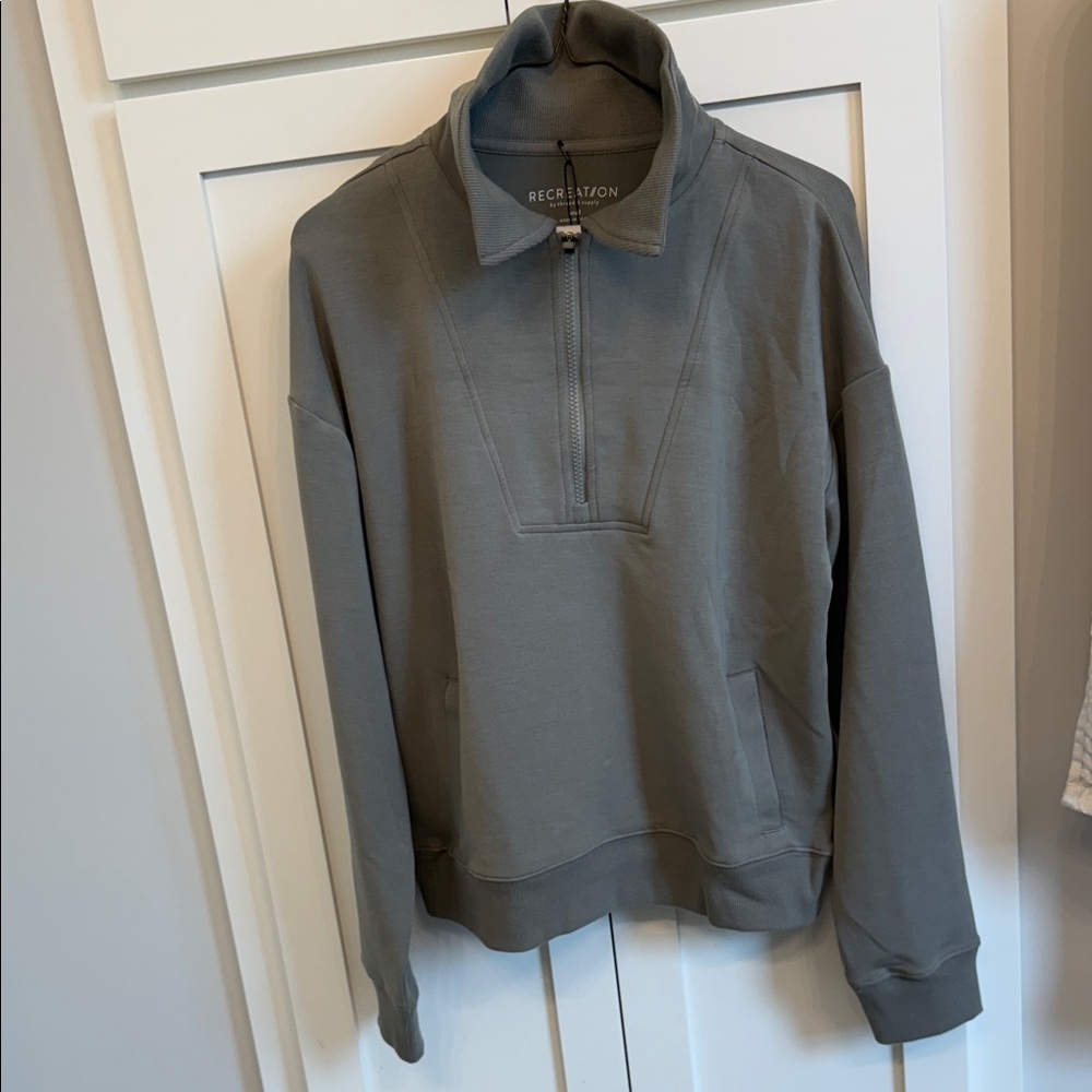 Olive gray/green quarter zip. NWT. Size small.